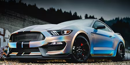 Full color-shifting vehicle wrap on a coupe.
